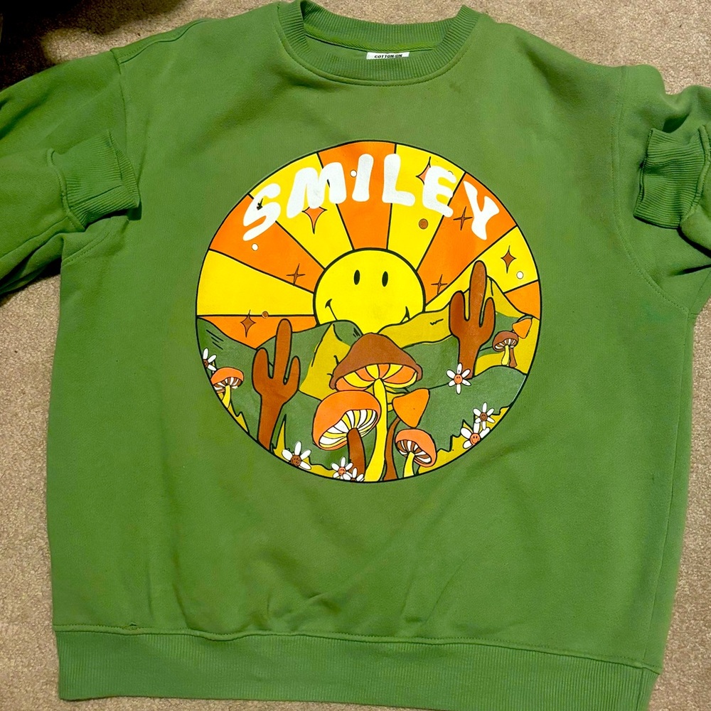 Green “smiley” groovy sweatshirt. Cottonon